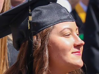 Student in graduation apparel