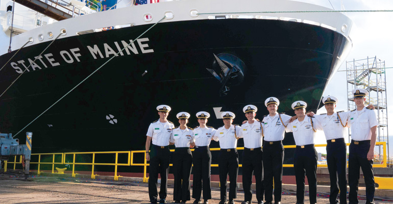 Students in front of TSSOM at ceremony