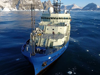 Aerial view of R/V Neil Armstrong at Kap Gustav Holm. (Photo by Croy Carlin © Woods Hole Oceanographic Institution)