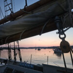 sunset under mast