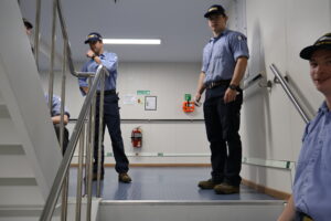 Cadets cleaning stairwell