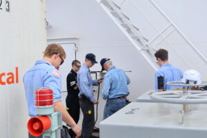 Cadets working with hoses