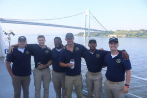 Cadets posing with bridge