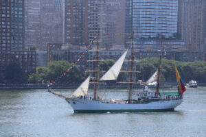 Tall ship sailing past