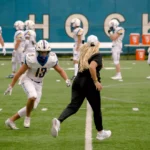 Football’s Cline tackles barriers, builds winning culture