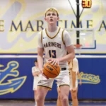 Men’s basketball drops Ken Wright Invitational opener to Elms